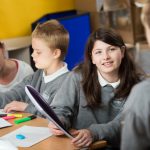 Pupils from Scottish primary school discussing a project