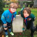 Alfie and Archie by a war memorial