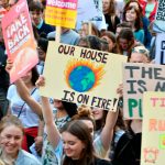 A crowd of young people at a climate protest