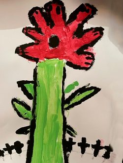 A poppy and some crosses, by George age 5