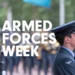 A still image from a Royal Air Force parade, with the words Armed Forces Week superimposed over the top.