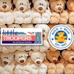 A wall of teddy bears in a shop with the little troopers and build a bear logos