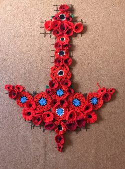 An anchor of crocheted poppies, by Sybil Williamson of Bowling Club Crafters
